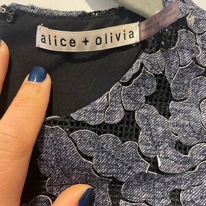 almost like new gorgeous work done on the dress!